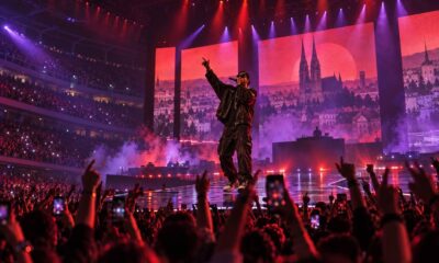 Koncertna ilustracija hip-hop izvođača na pozornici Arene Zagreb.